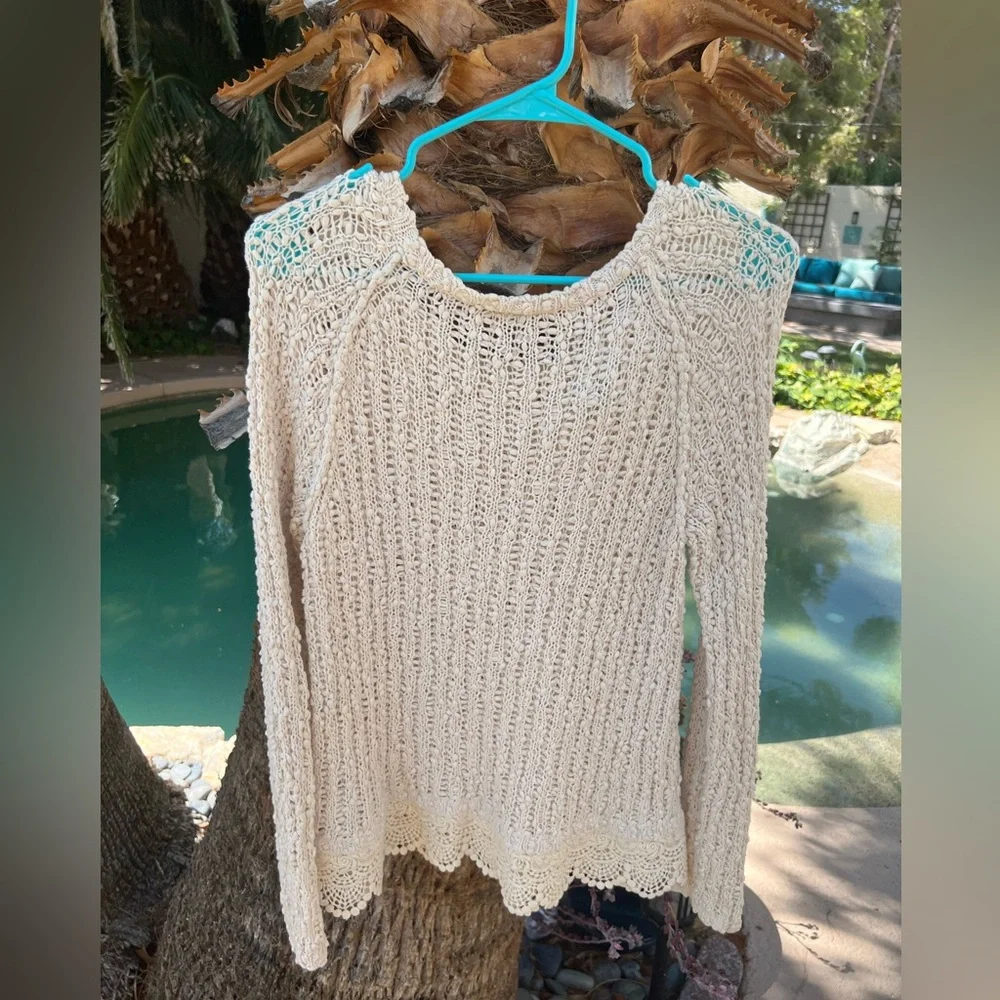 White and soft sweater.